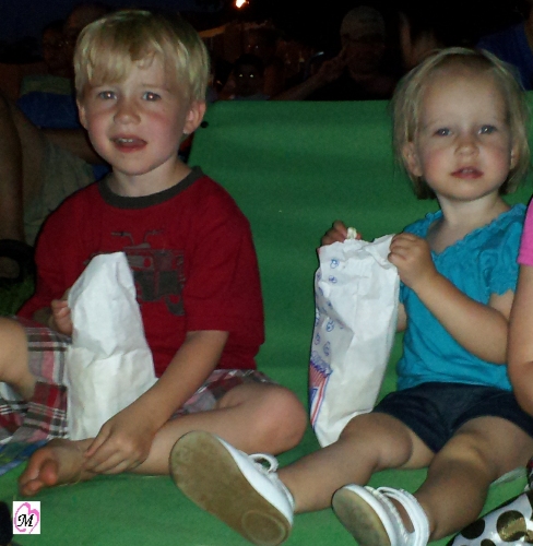 kids watching outdoor free movie